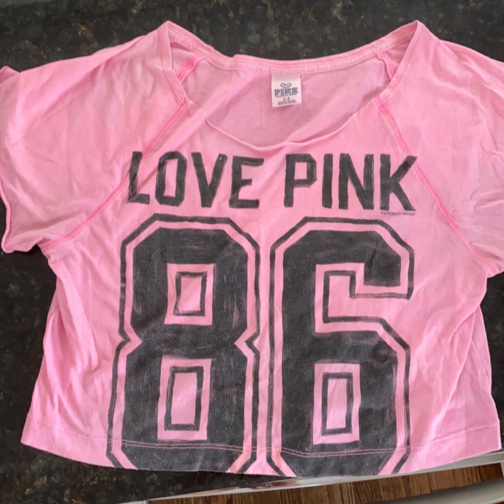 Pink Victoria Secret crop t-shirt.
